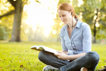 Studying in a Park at Sunset