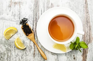 Crédence de cuisine en verre imprimé Theé Tasse de thé au citron et à la menthe