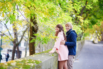 Fototapeta premium Young dating couple in Paris on a nice spring day