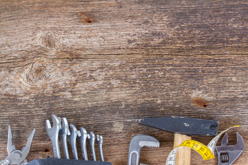 tools kit frame on wooden planks