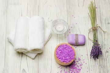 Fototapeta na wymiar lavender salt towel table wood soap candle