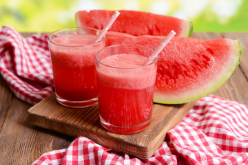Juicy watermelon on table on bright background