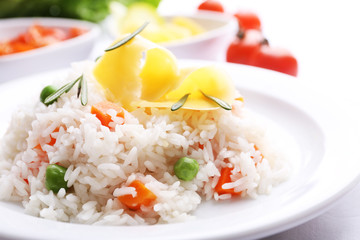 Vegetable rice served on table, close-up