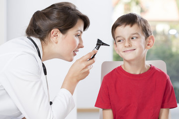 Examinating boy's hearing
