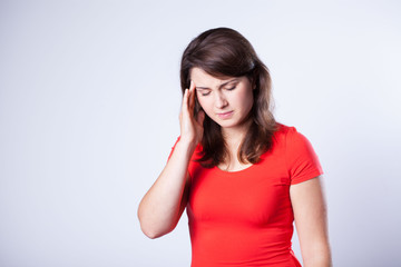 Fototapeta premium Young woman with headache