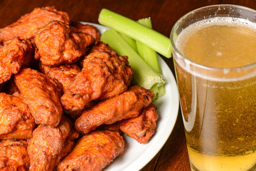 Buffalo Wings with Celery Sticks and Beer - 75015272