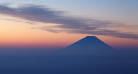 Fototapeta na wymiar Top of Mountain Fuji and sunrise sky