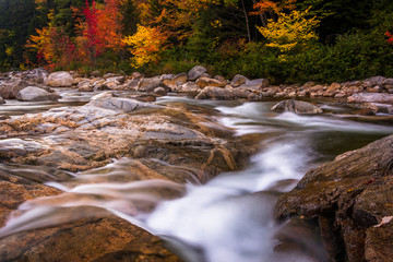 Autumn color and cascades on the Swift River, along the Kancamag