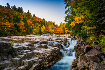 Autumn color and waterfall at Rocky Gorge, on the Kancamagus Hig