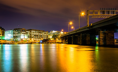 Bridge and buildings along the Washington Channel at night, in W