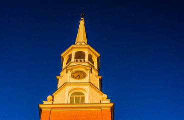 Fototapeta na wymiar Evening light on the steeple of a church in York, Pennsylvania.