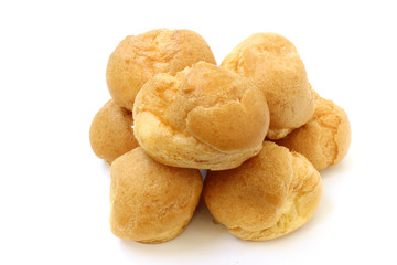 Profiteroles on a white background