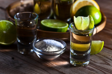 gold tequila with salt and lime