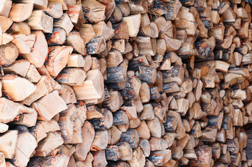 Woodpile from dry oak logs.