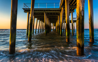 Fishing pier and waves on the Atlantic Ocean at sunrise in Ventn