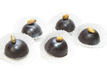 chocolate candy with filling on white background