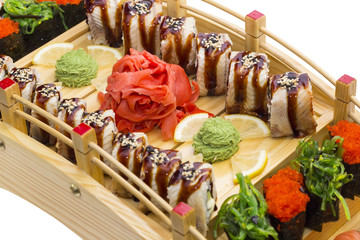 Japanese sushi, vegetables and seafood in the restaurant