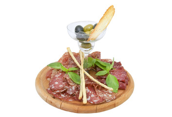 plate of cold meats and sauce on a white background