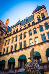 Fototapeta premium Looking up at a statue and old building in downtown York, Pennsy