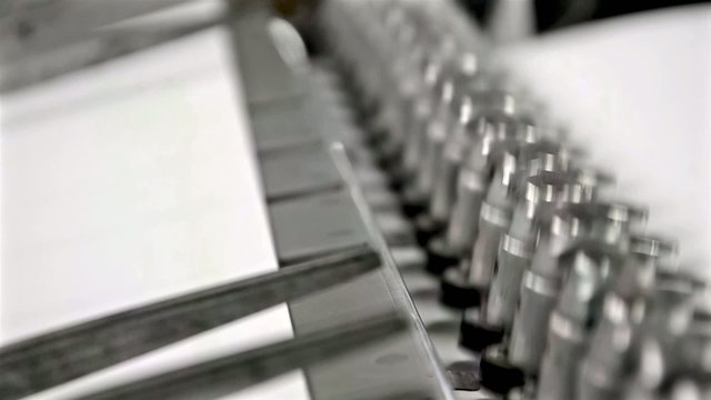 Print sheets loaded in offset printing press machine