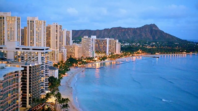 Night view on Honolulu city, Diamond Head and Waikiki Beach