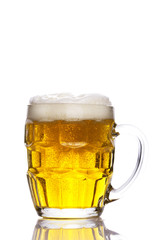 Mug with beer isolated on white