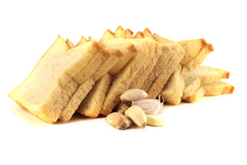 Bread slices with garlic. Isolated object on white background.