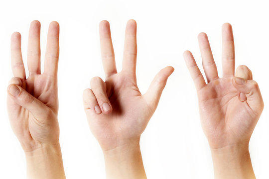 Male hand showing three fingers on white background