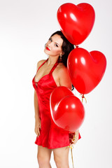 Sexy brunette with balloons heart