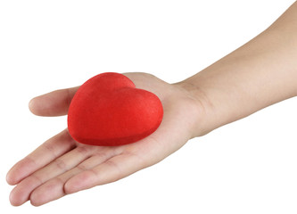 red heart in hand, a symbol of love and health