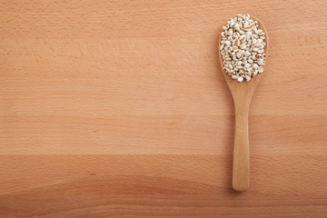 Jobs tears with wooden spoon