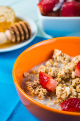 Bowl with cereals with milk and fresh fruit