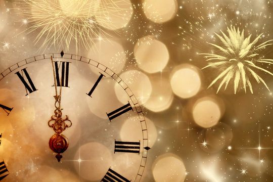 Vintageclock with fireworks and holiday lights
