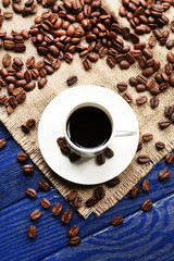 Cup of coffee on wooden table