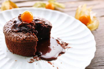 Hot chocolate pudding with fondant centre on plate, close-up