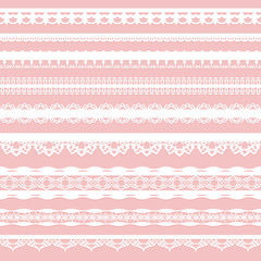 Set of white lace braid isolated on a pink background.