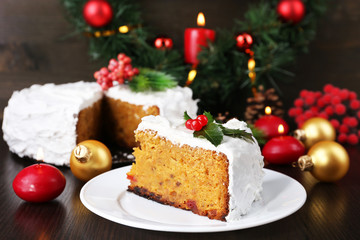 Slice of cake covered cream with Christmas decoration