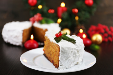 Slice of cake covered cream with Christmas decoration