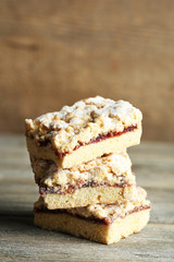 Tasty homemade pie on wooden table
