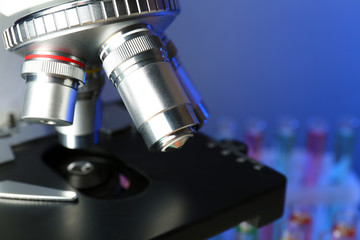 Fototapeta na wymiar Microscope on color background, close-up