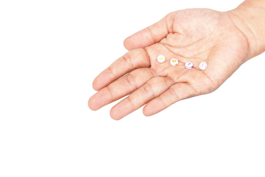 Hand holding beads isolated on white background