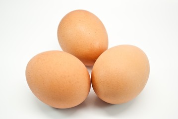 three eggs isolated on white background
