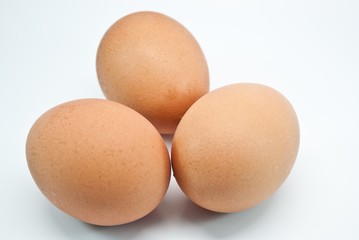 three eggs isolated on white background