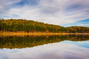Fototapeta na wymiar Autumn reflections in Sheppard-Meyers Reservoir, in Hanover, Pen