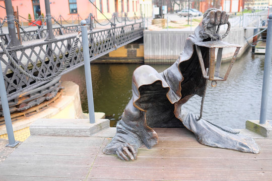 statue of the creeping ghost on the embankment of Klaipeda, Lith