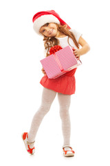 Child holding Christmas gift box in hand. Isolated on background