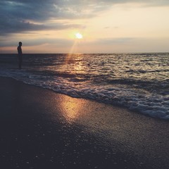 Alone man in a sea beach