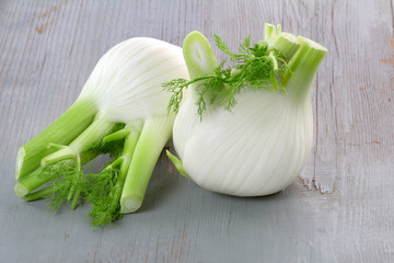 fennel isolated on wooden background