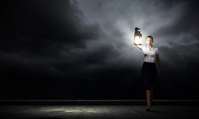 Fototapeta na wymiar Businesswoman with lantern