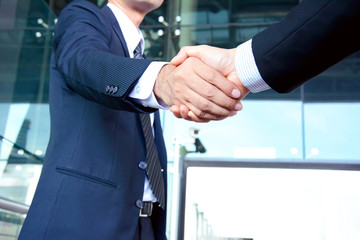 Handshake of businessmen - successful & partnership concepts